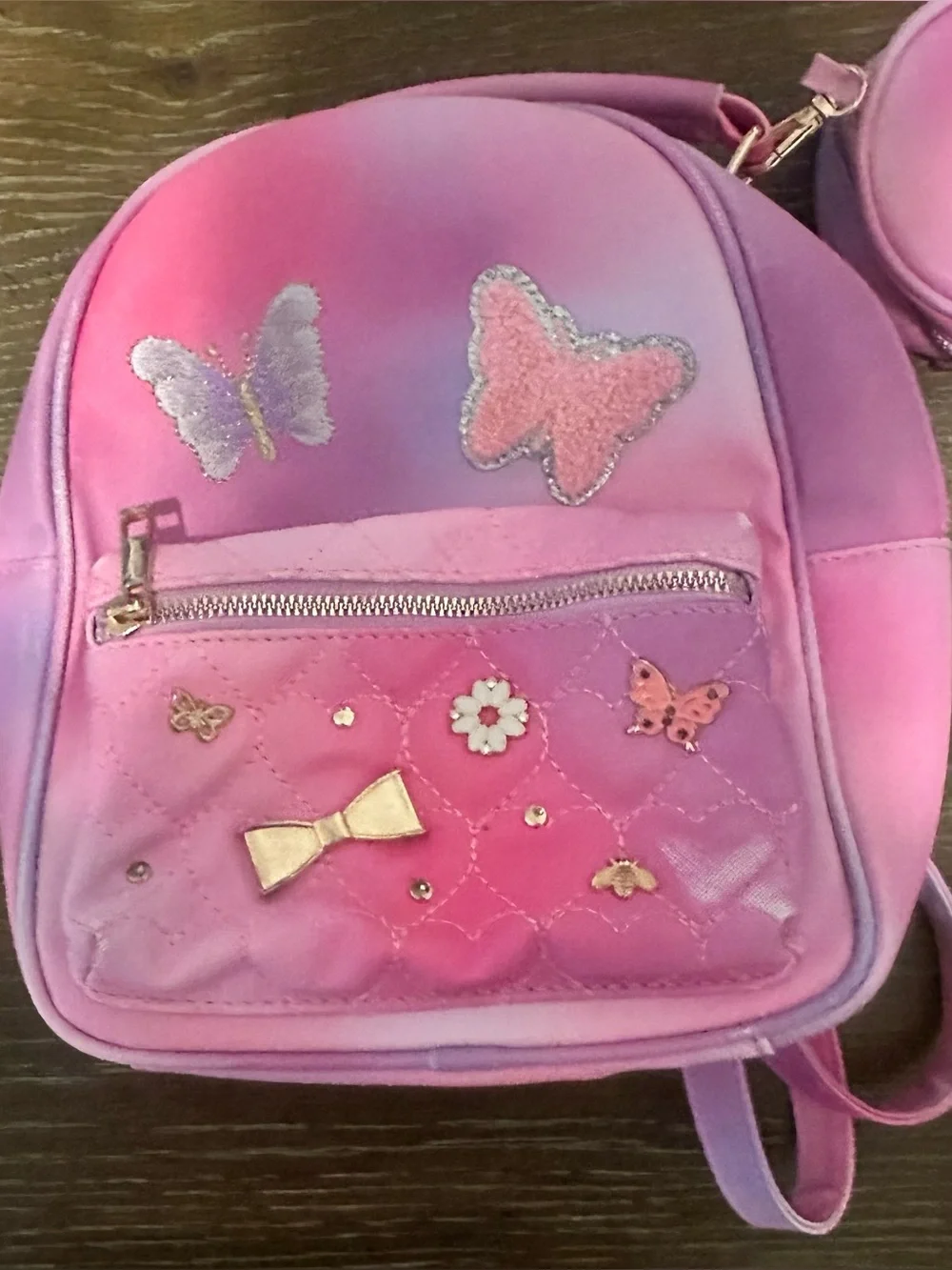 Bundle of 4 min-backpacks/purses